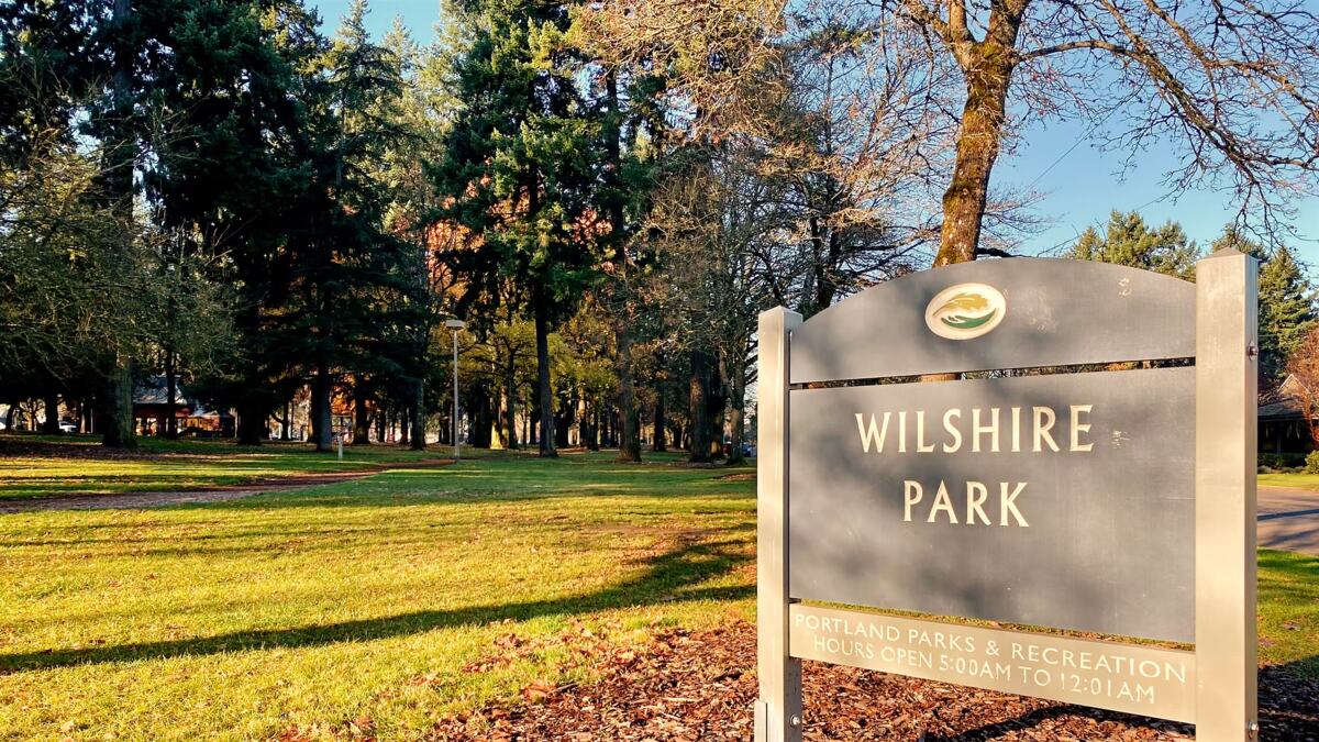 The Wilshire Park sign in golden morning light