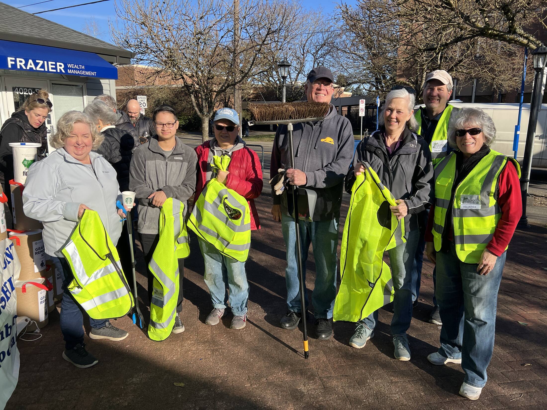 Volunteers in safety vests at a Fremont Street clean-up