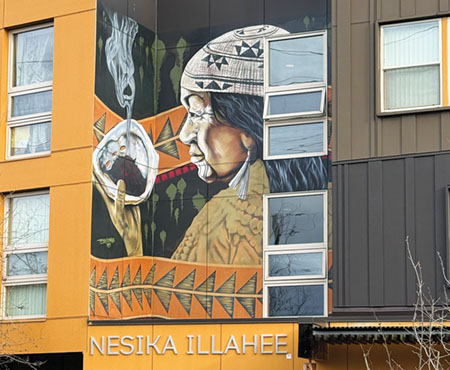 A Native-inspired mural graces the exterior of the Nesika Illahee apartment building on NE 42nd Avenue in the Cully neighborhood. Photo by Susan Trabucco.