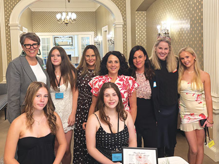 Beaumont-Wilshire 'Tick-Tockers' in attendance at the National Charity League's Annual Tea held recently at the Waverly Country Club. Standing, from left to right: Amy Donahue, Margot Gilley, Laura Chehab, Kerry Gilley, Colby Lawn, Jennifer Weddel, and Rémy Wagner. Seated: Hazel McKean and Maya Chehab. Photo by Nancy Bartow.