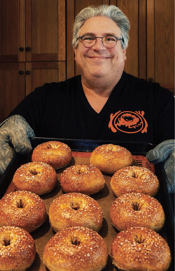 David Friedman, B-W resident, artist, valued newsletter team member, and now a baker, shows off a batch of freshly made plain bagels with Maldon Sea Salt. Photo by David Friedman.