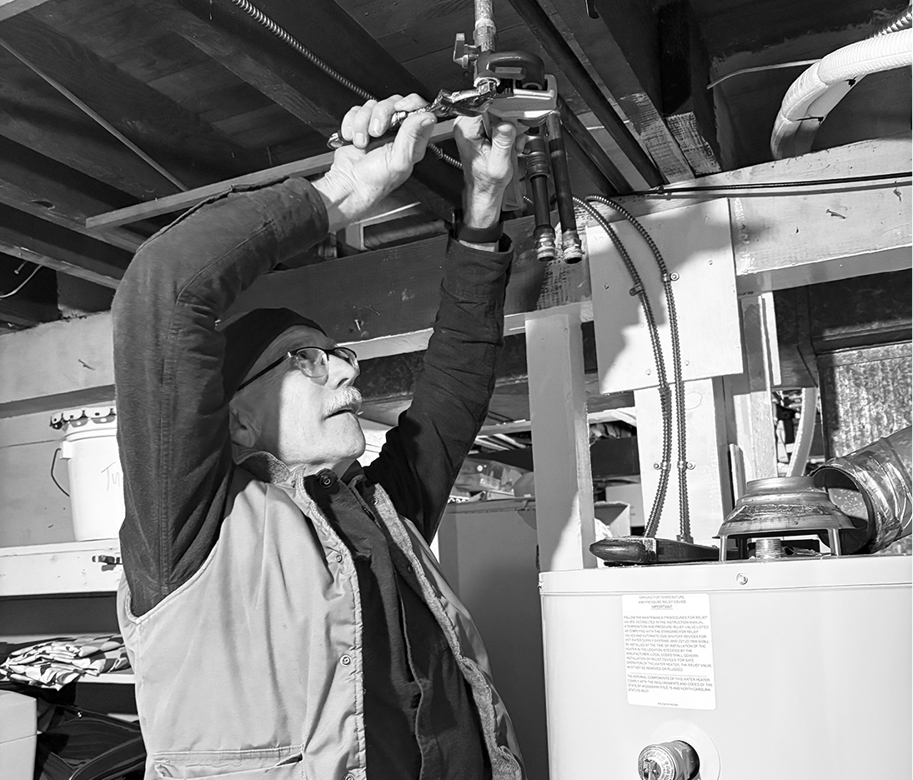 Installation of an electric heat pump water heater replacing a gas unit