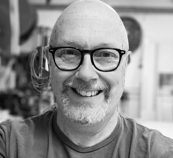 Patrick of Curve CNC, a routing and wood fabrication studio on NE 50th Ave