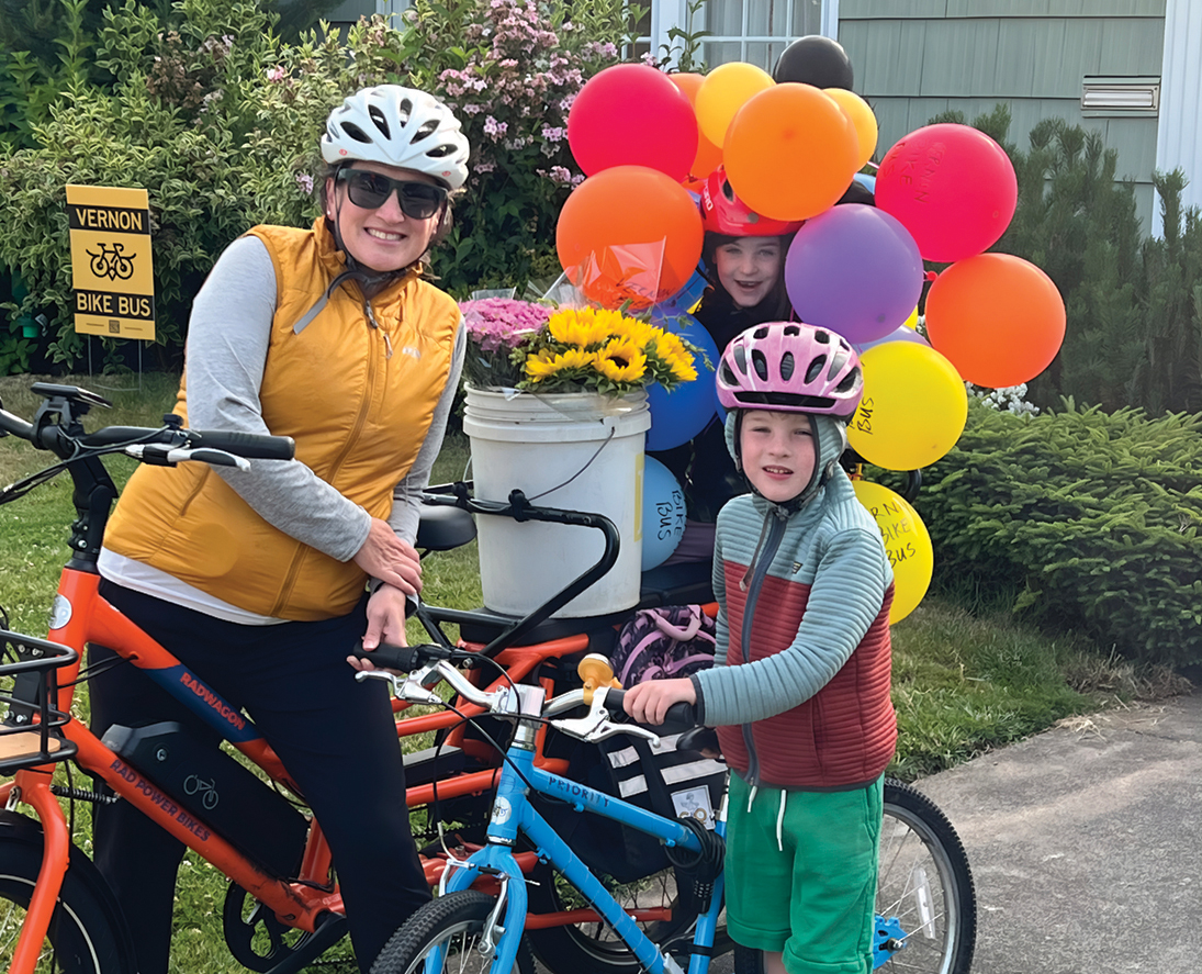 A Beaumont-Wilshire neighbor passed the newsletter distribution torch to Beth Fitzgerald and her twins, Tamsin and Beckett. Submitted photo.