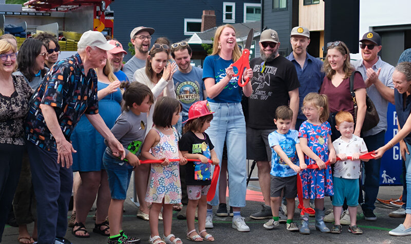 BWNA Board President Al Ellis leaning in at left and BBA President Mary Meyers with scissors in hand at the July 11 ribbon cutting. Photo courtesy of BBA.