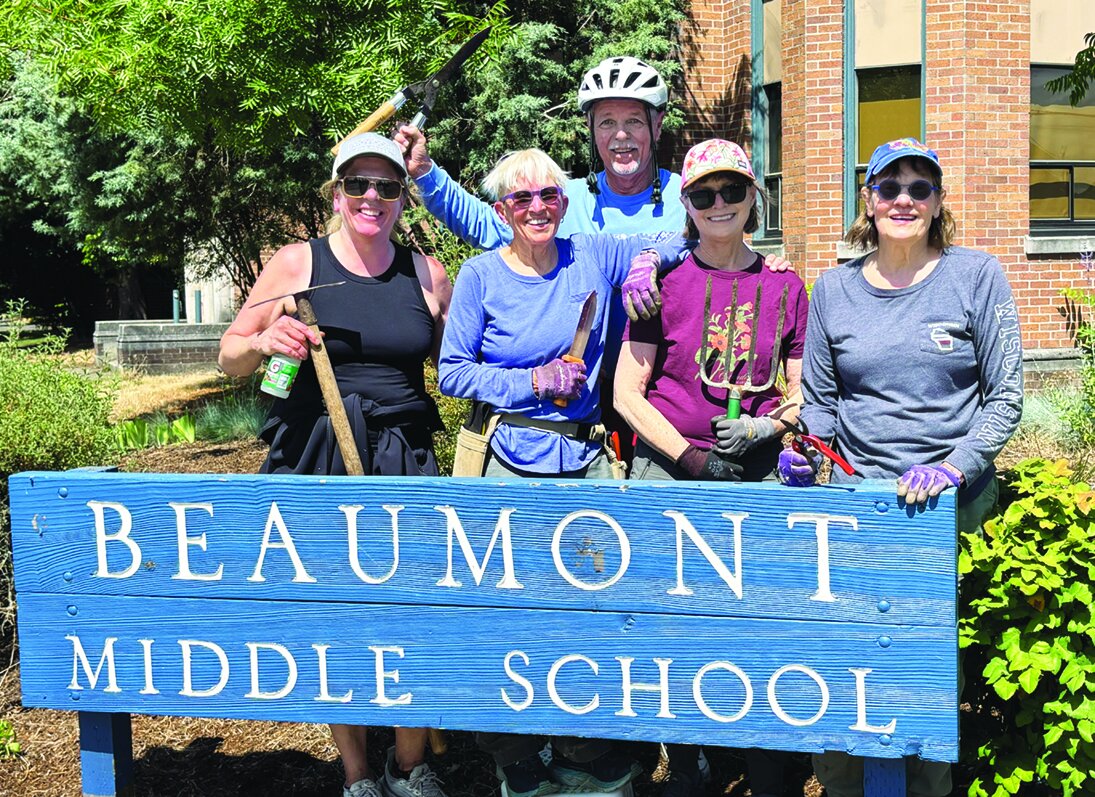 BWNA volunteers who whacked at weeds on the BMS school grounds this summer picked up Alameda resident Michael Wright, aka "Mike on a Bike," who stopped by to help. From left: Angela Frome, Patti Koehler, Michael Wright, Joan Meyerhoff, and Kate Krider. Not pictured are Karla Lenox and Mike Frome. Photo by Mike Frome.